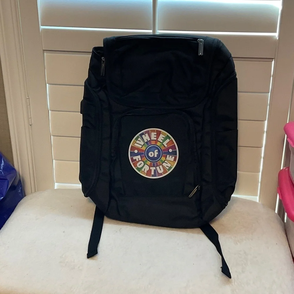 Men's Black Backpack with Colorful Wheel Design